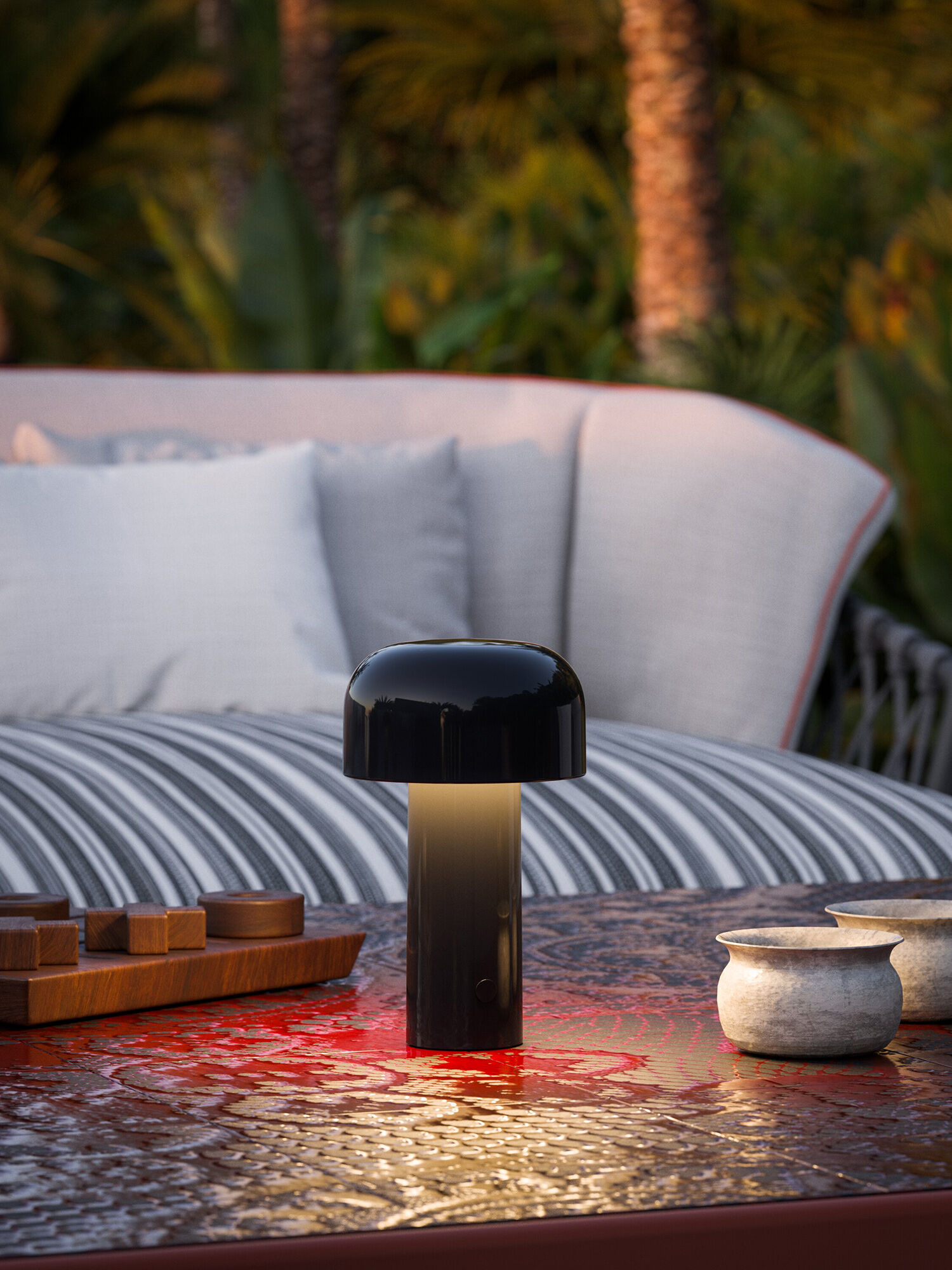 Bellhop Unplugged: portable lamp for indoor and outdoor use | Flos